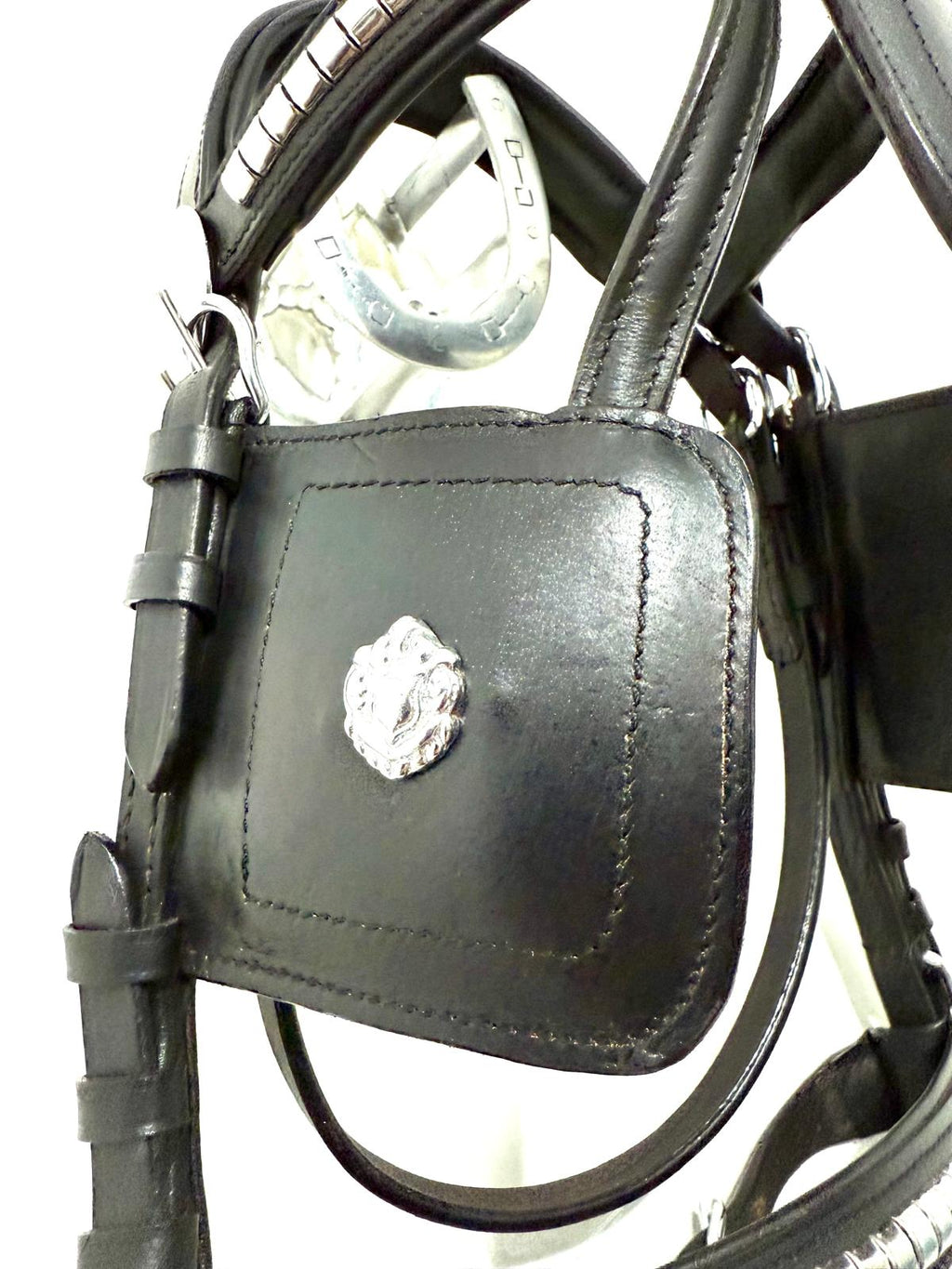 "Black leather big pony driving bridle buckle close up – Sui Saddlery"
